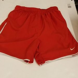 Nike Boys medium running orange shorts